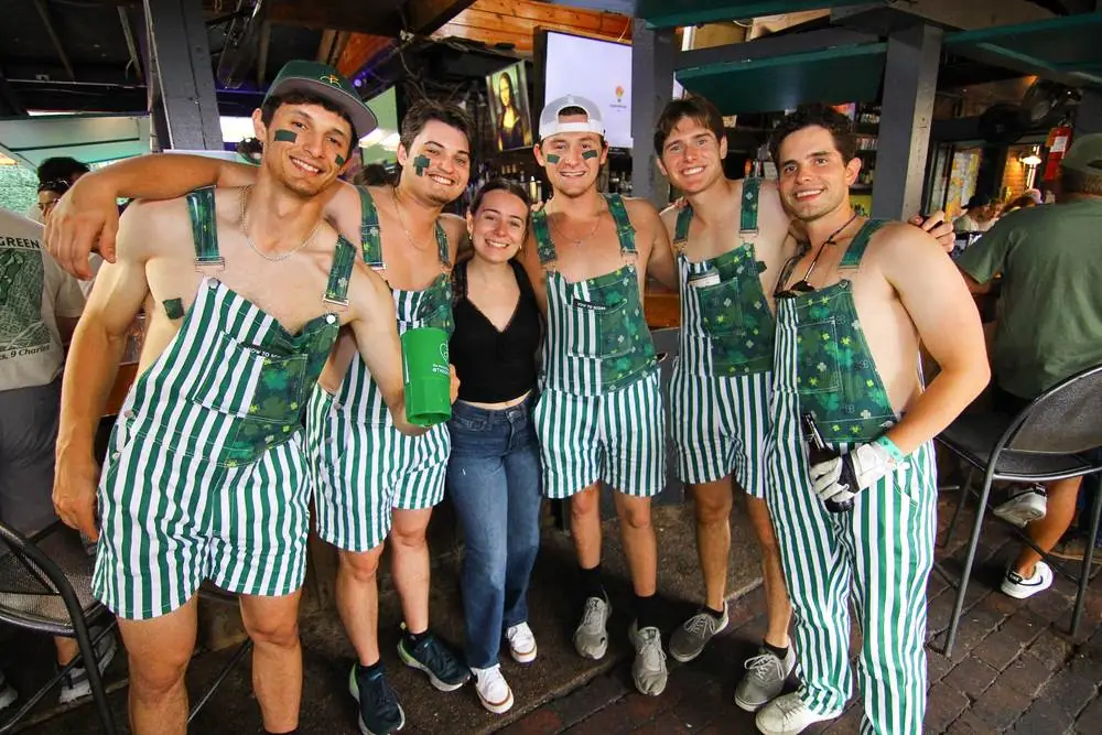 Attendees at a Giving Green bar